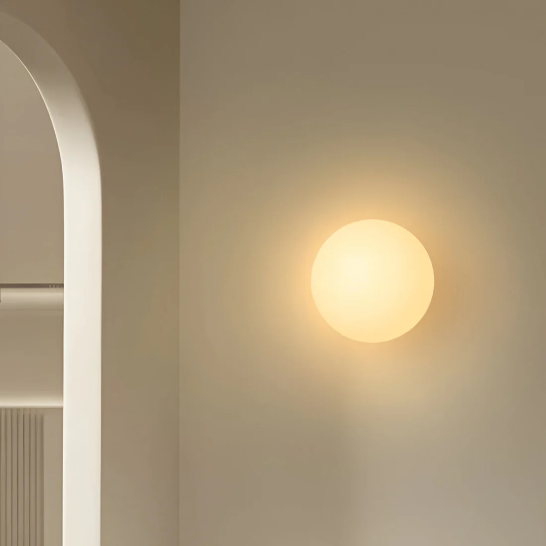 Pietra Luma | Ronde glazen wandlamp met warm wit LED-licht