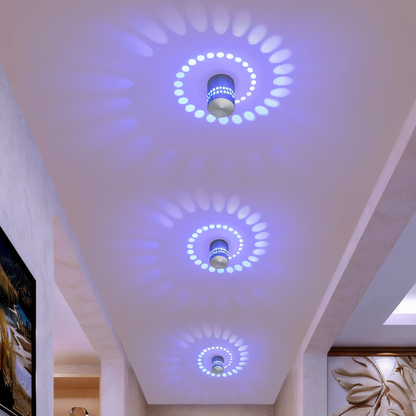Lythera | Zylindrische LED Wandleuchte mit farbiger Spiralbeleuchtung