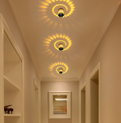 Lythera | Zylindrische LED Wandleuchte mit farbiger Spiralbeleuchtung
