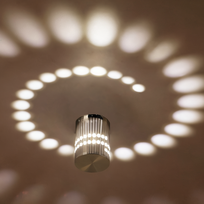 Lythera | Zylindrische LED Wandleuchte mit farbiger Spiralbeleuchtung