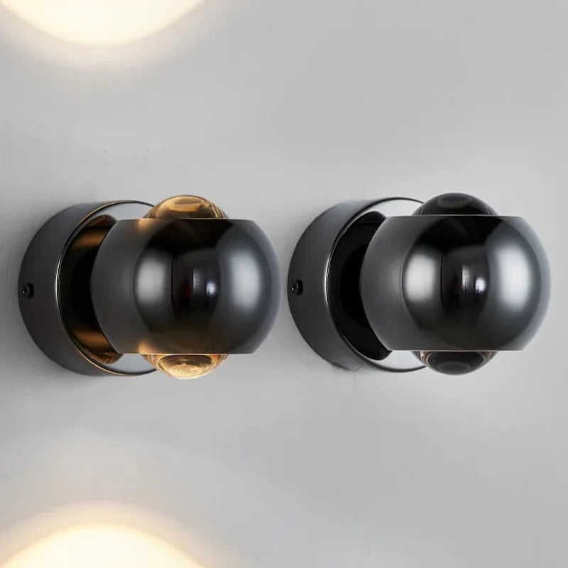 Orbis LED-wandlamp – draaibare bolvormige lamp in zwart met 360° lichtuitlijning
