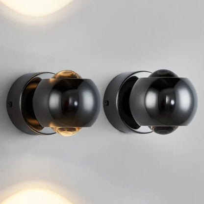 Orbis LED-wandlamp – draaibare bolvormige lamp in zwart met 360° lichtuitlijning
