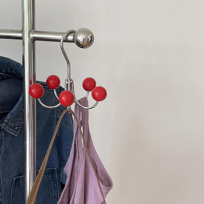 Nuvio Turna | Drehbare Wandgarderobe mit bunten Holzkugelhaken