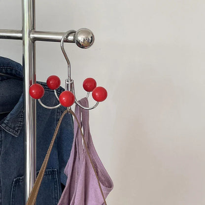Nuvio Turna | Drehbare Wandgarderobe mit bunten Holzkugelhaken