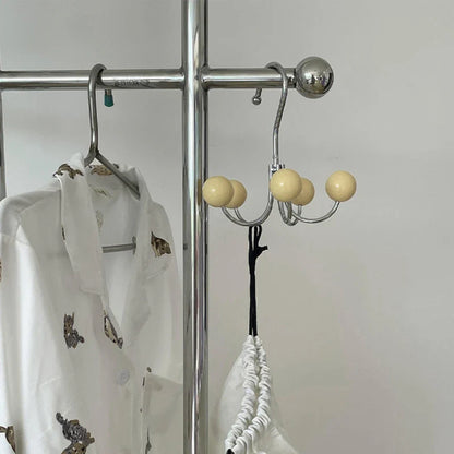 Nuvio Turna | Drehbare Wandgarderobe mit bunten Holzkugelhaken